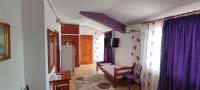 Dreibettzimmer mit Meerblick