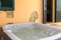 10 min dal mare - Appartamento con giardino e Jacuzzi - B&B