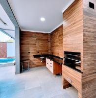 Casa Encantadora com piscina quentinha, lazer completo e do lado da praia - B&B
