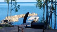 Mukava pieni 2-4h mökki min 2 vrk Saimaan rannalla, poreallas, puusauna, Wi-Fi, Smart TV, parivuode ja vuodesohva - B&B