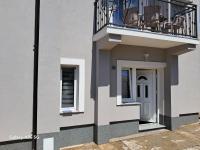 Three-Bedroom Apartment with Terrace and Sea View