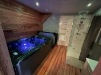 Logement avec jacuzzi Murat - B&B