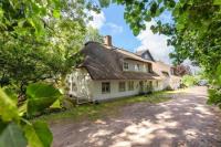 Föhrzeit Wohnung 3 Kuschelig unter Reet mit Garten - Ferienwohnung Borgsum