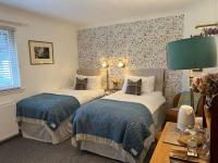 Tweepersoonskamer met 2 Aparte Bedden