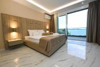 Camera Tripla Deluxe con Vista Mare