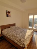 One-Bedroom Apartment with Balcony and City View