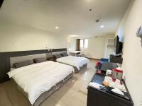 Standard Zimmer mit 2 Einzelbetten und Sofa