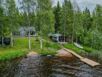 Lähderinne - 2 bedroom log cabin, private beach, wifi & sauna - B&B Puolanka