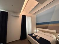 Deluxe Zimmer mit Kingsize-Bett