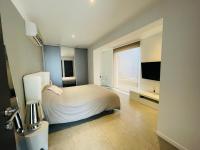 Kamer met Queensize Bed en Uitzicht op Zee