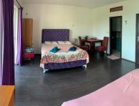 Chambre Quadruple avec Balcon et Vue sur la Mer