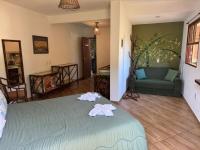 Chambre Double avec Balcon (2 Adultes + 1 Enfant)