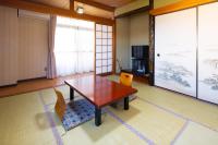 Quadruple Room with Shared Bathroom