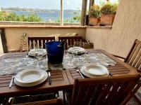 Vista mare La Maddalena con posto Barca e posto Auto coperto - B&B La Maddalena