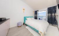 One-Bedroom Apartment with Balcony and Sea View