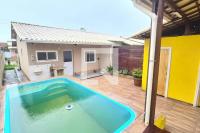 Casa com Piscina em condomínio - B&B