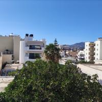 One-Bedroom Apartment with Balcony and City View