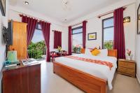 Habitación doble deluxe con cama grande y balcón