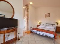 Dreibettzimmer mit Balkon