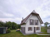 Reetland am Meer - LuxusPlus Reetdachvilla mit 4 Schlafzimmern, Außensauna, Loungebereich und Kamin H06 - Chambres d'hôtes Dranske