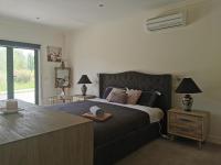 Kamer met Kingsize Bed en Uitzicht op de Tuin