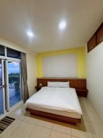 Zimmer mit Queensize-Bett und Meerblick
