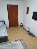 Dreibettzimmer mit Gemeinschaftsbad