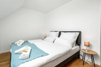 Nexstay - Balkonapartment Deluxe mit Parkplatz nähe S-Bahnhof - Ferienwohnung