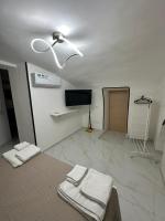 Camera Deluxe (2 Adulti + 1 Bambino)