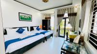 Deluxe Dreibettzimmer mit Stadtblick