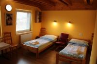 Dreibettzimmer mit Gartenblick