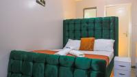 DefiniteHomes2 - Fully furnished studio apartment with a rooftop restaurant near JKIA Airport, SGR Terminus, Downtown Nairobi - Chambres d'hôtes Nairobi