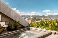 Two-bedroom penthouse with terrace and spa bath.