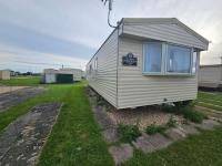3 bedroom caravan close to beach and fantasy island - B&B