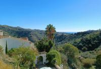 Charming Casa with Large Terrace and Sea View, 30 minutes from Malaga - Chambres d’hôtes Moclinejo