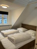 Nyrenoveret charmerende byhus - Chambres d’hôtes Assens