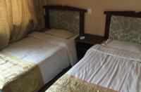 Xingxing Inn, Отели - Yulin