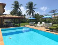 Casa de praia com piscina maravilhosa, churrasqueira e grande área verde, a menos de 300 metros da praia de Vilas - Bed and Breakfast