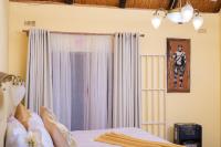 Suite mit Kingsize-Bett mit Whirlpool