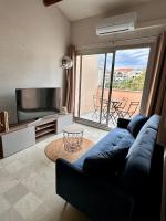 Évasion Sétoise - Appartement avec balcon vue marina, climatisé, parking - Situé à 200m de la plage - Chambres d'hôtes Sète