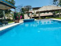 Cerca de Salones de Fiesta, con Alberca, AC e Internet - Chambres d’hôtes Xochitepec