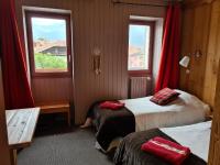Tweepersoonskamer met 2 Aparte Bedden