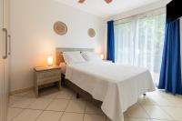 Two Palms Ground Floor Unit Across from Beach - Ferienwohnung Coco, Sardinal