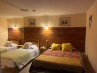 Habitación Cuádruple Deluxe