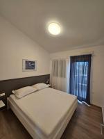 One-Bedroom Apartment with Balcony and Sea View