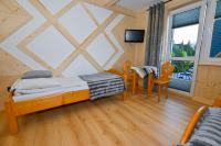 Chambre Triple – Vue sur Montagne