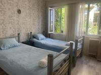 Habitación Estándar con baño compartido - 2 camas