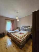Chambre Triple – Vue sur Montagne