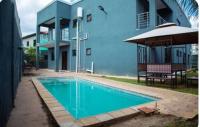Exotic Mimosa Serviced Apartment Accommodation - B&B