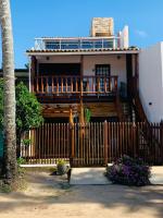 Suíte frente mar com cozinha e quintal pés na areia - B&B